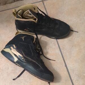 Black and Gold Air Jordan Sneakers